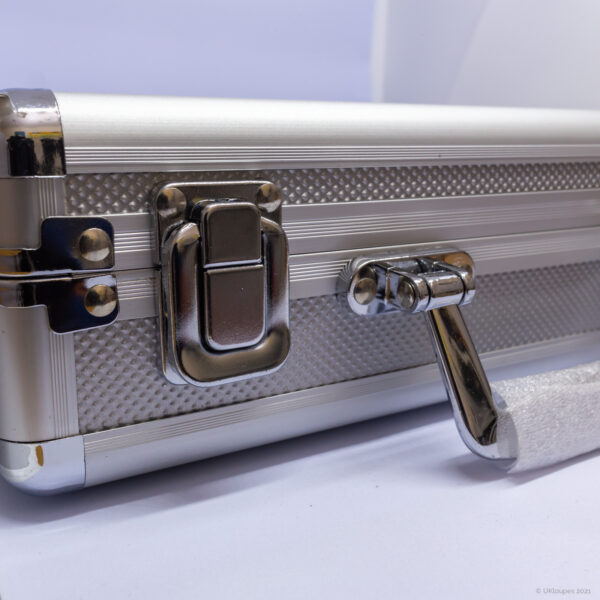 Hard combo case metal latch close-up from UKloupes